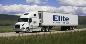An Elite Logistics LLC refrigerated reefer trailer traveling a major U.S. interstate, representing nationwide cold chain freight coverage across 48 states.