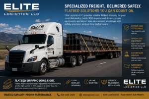 Flatbed truck transporting heavy industrial equipment, representing specialized freight shipping rates for oversized loads with Elite Logistics LLC
