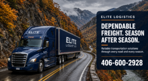 Blue Elite Logistics semi-truck traveling through a mountain gorge surrounded by golden autumn foliage.