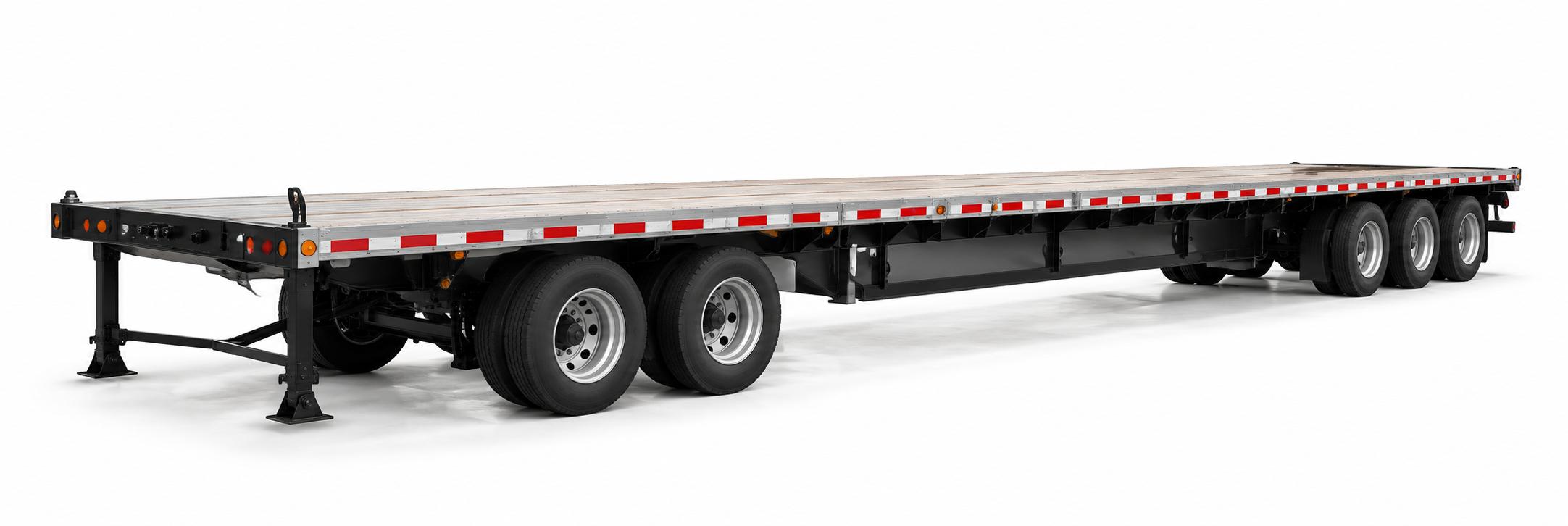 Empty standard flatbed trailer with landing legs and reflective side markings on a white background.