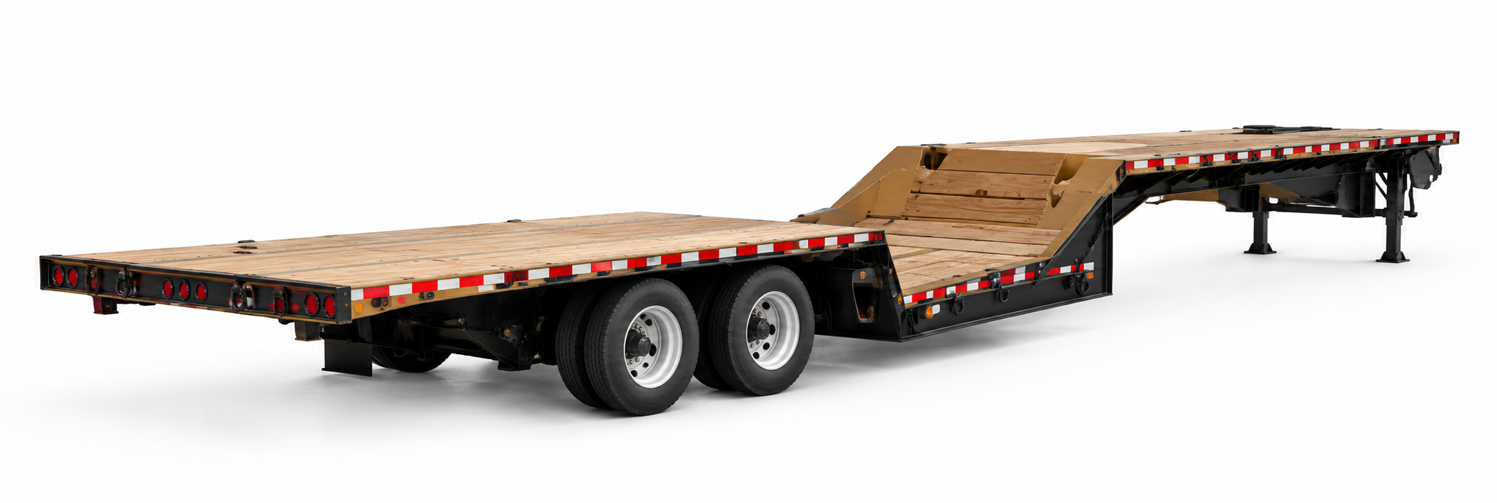 Double drop lowboy trailer with a low center well for hauling tall heavy equipment, Elite Logistics LLC heavy haul and flatbed trucking